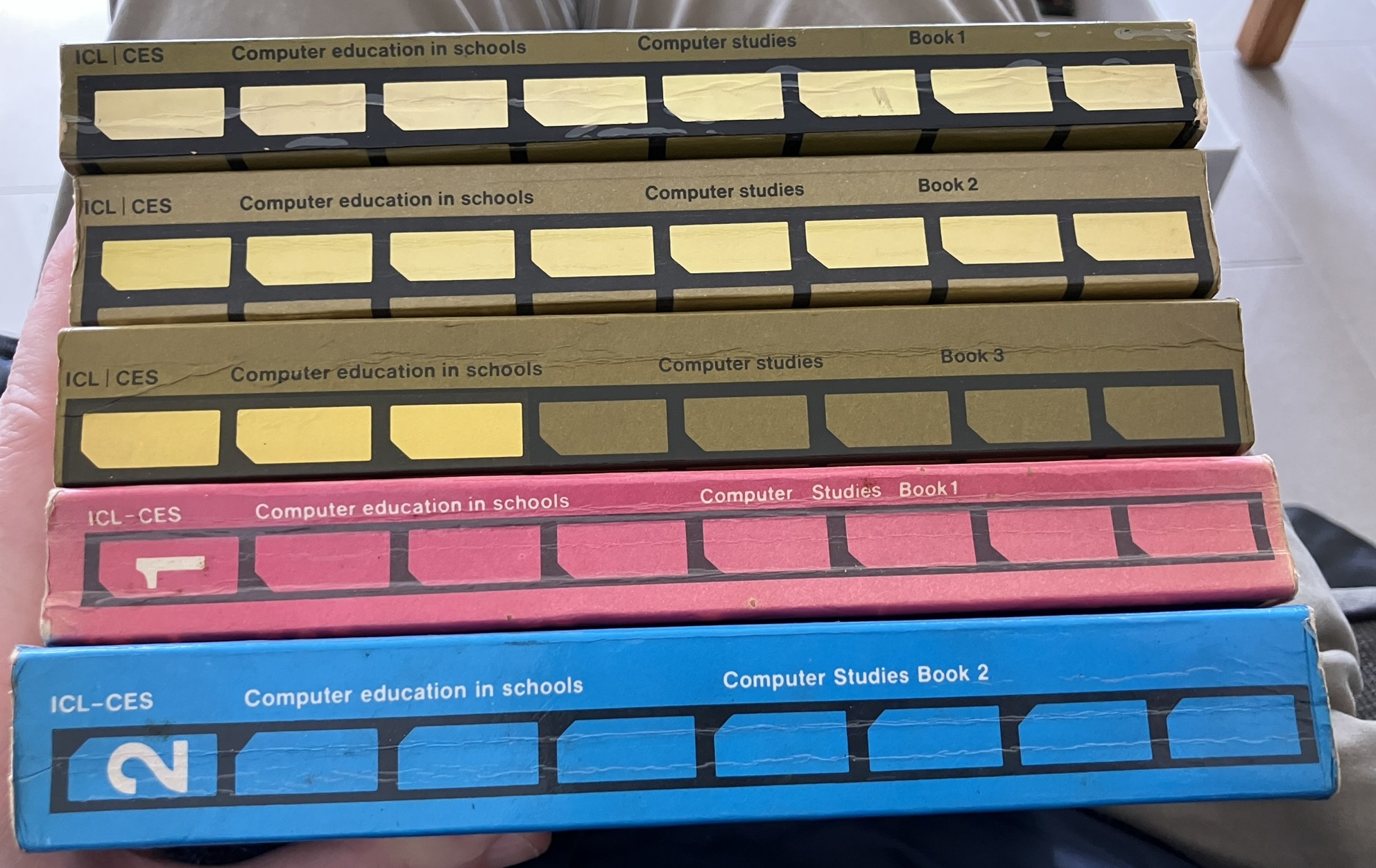 NAEC ICL pupils books next to each other